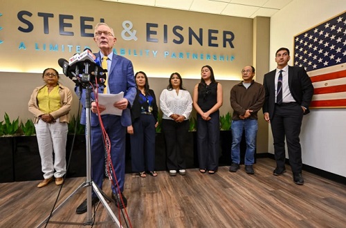 Attorney Shawn Steel stands with some of the plaintiffs from a lawsuit filed against GKN Aerospace during a press in Seal Beach, CA, on Friday, May 29, 2026. Steel & Eisner LLP, on behalf of dozens of plaintiffs, filed a lawsuit against GKN Aerospace for the hazardous gas leak that forced the evacuation of 50,000 people near the Garden Grove facility. (Photo by Jeff Gritchen, Orange County Register/SCNG)