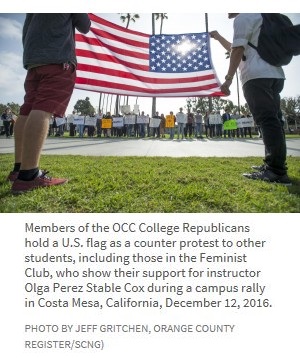 Members of the OCC College Republicans hold a U.S. flag as a counter protest to other students, including those in the Feminist Club, who show their support for instructor Olga Perez Stable Cox during a campus rally in Costa Mesa, California, December 12, 2016. Photo by Jeff Gritchen, Orange County Register/SCNG) Members of the OCC College Republicans hold a U.S. flag as a counter protest to other students, including those in the Feminist Club, who show their support for instructor Olga Perez Stable Cox during a campus rally in Costa Mesa, California, December 12, 2016. Photo by Jeff Gritchen, Orange County Register/SCNG)